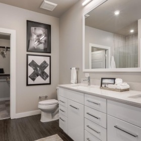 Bathroom options with thoughtful details a bathroom with a large mirror