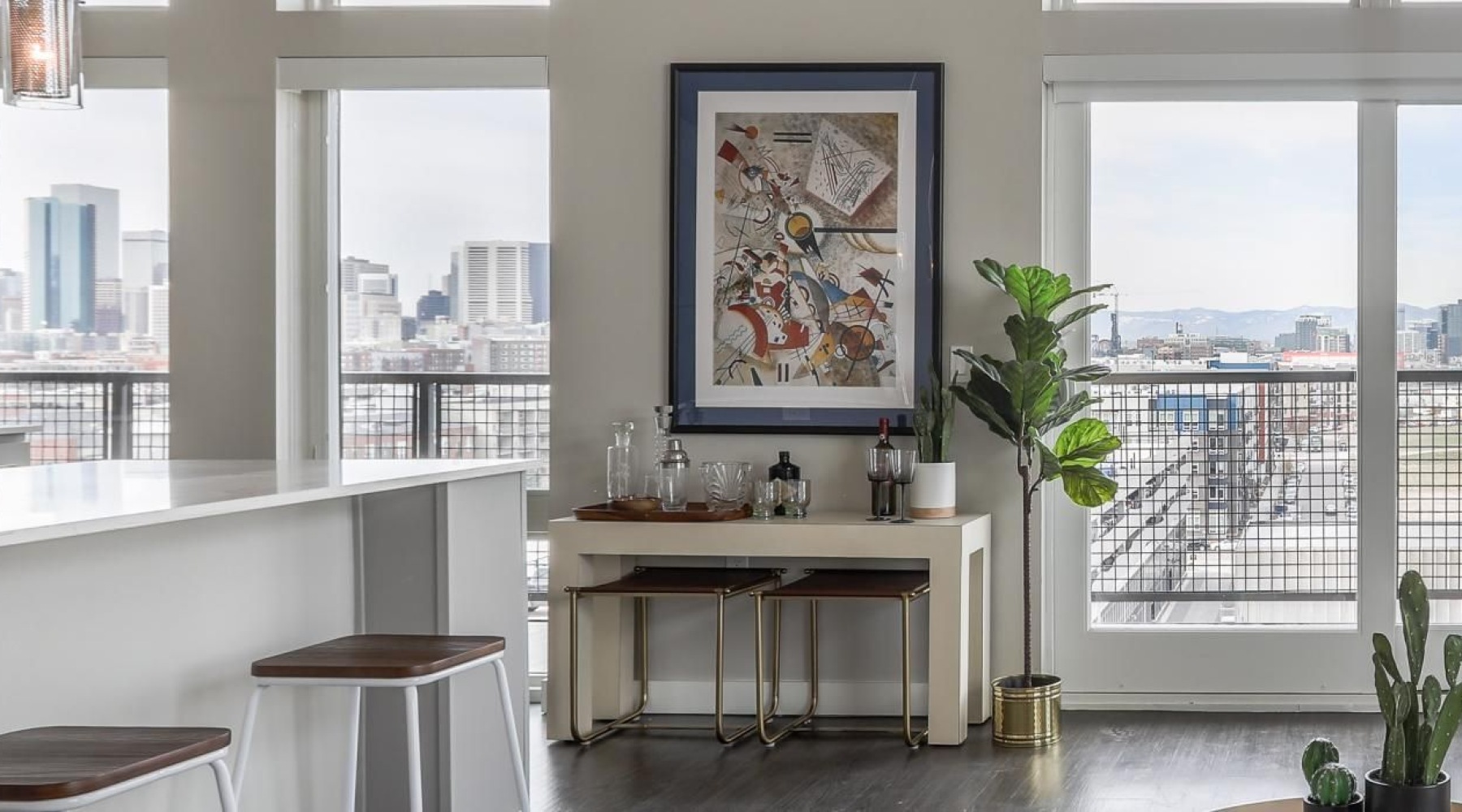 Gorgeous natural light in your living space a room with a table and chairs