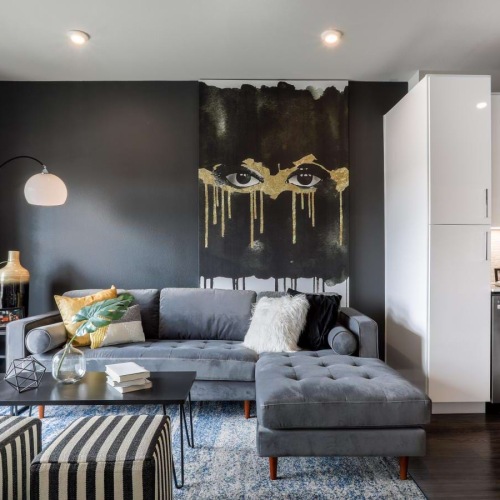 a living room with a couch and a table