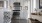 a kitchen with white cabinets
