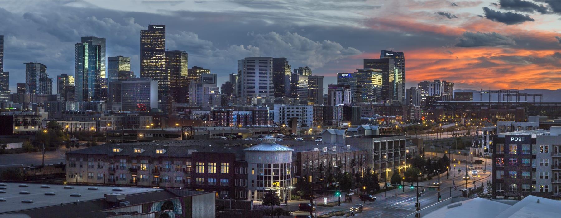 a city with a sunset