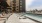 a pool in a courtyard between buildings