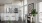 a kitchen with white cabinets