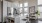 a kitchen with a bar stool and a table